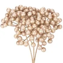 Produkt Sztuczna gałązka jagód, dekoracja w kolorze szampańskim, 28 cm, 3 sztuki