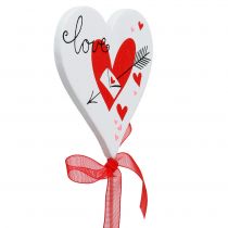 Produkt Wtyczka kwiatowa serce biała z kokardką 7cm 12 szt