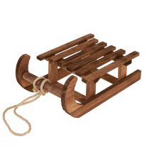 Produkt Dekoracyjna zimowa dekoracja sań w kolorze brązowym wykonana z drewna o wymiarach 30x18x12cm