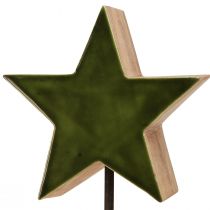 Produkt Dekoracyjna gwiazda drewniana na podstawie patyka zielono-brązowa 20x9,5x50cm