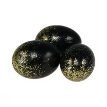 Produkt Ozdobne pisanki prawdziwe jajo kurze czarne ze złotym brokatem wys. 5,5–6 cm 10 sztuk