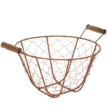 Produkt Koszyk metalowy w stylu vintage, okrągły, z drewnianymi uchwytami, wykończenie rdzawe, Ø22 cm