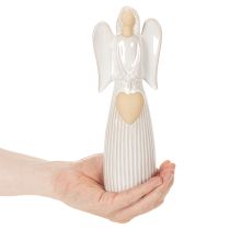 Produkt Figurka anioła z serduszkową dekoracją w kolorze kremowo-białym, 23 cm