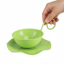 Produkt Filiżanka dekoracyjna metalowa ze spodkiem, jasnozielona, wys. 8 cm, Ø11,5 cm, 2 sztuki