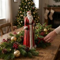 Produkt Figurka Świętego Mikołaja z koszem w kolorze czerwono-biało-zielonym, wys. 36 cm
