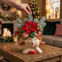 Produkt Ceramiczna doniczka dekoracyjna w kształcie dziewczynki z głową rośliny, wysokość 17 cm