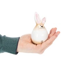 Produkt Ceramiczna figurka dekoracyjna w kształcie białego jajka w kształcie zajączka wielkanocnego, Ø6 cm, wys. 11,5 cm