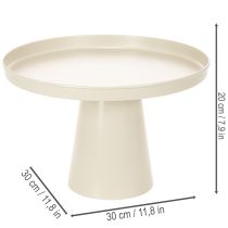 Produkt Okrągła taca dekoracyjna w kolorze kremowym, 30 cm, na podstawce do dekoracji stołu