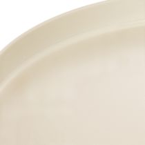 Produkt Okrągła taca dekoracyjna w kolorze kremowym, 30 cm, na podstawce do dekoracji stołu