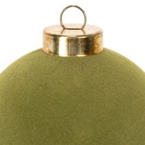 Produkt Bombka choinkowa, aksamitna, zielona, mix tekstur, 8 cm, 12 sztuk. Bombka świąteczna, flokowana w kolorze zieleni mchu, plastikowe bombki, flokowane w kolorze zieleni mchu. Bawełniany sznurek w zestawie do każdej bombki.