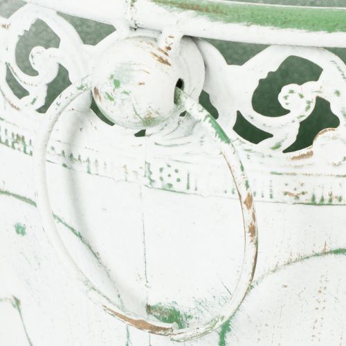 Produkt Doniczka metalowa z tłoczonym wzorem i uchwytami, biało-zielona, w stylu shabby chic, wys. 22/19,5/17,5 cm, śr. 25,5/20,5/15,5 cm, zestaw 3 szt.