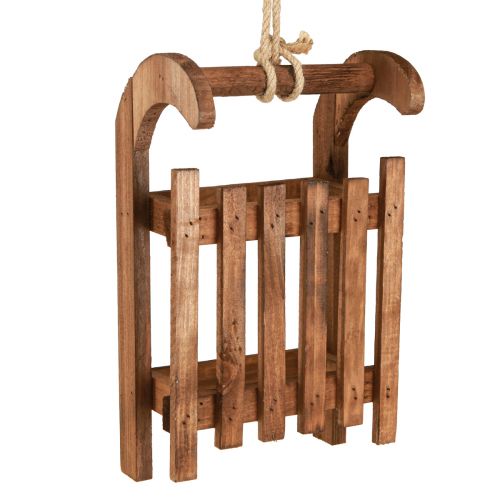 Produkt Dekoracyjna zimowa dekoracja sań w kolorze brązowym wykonana z drewna o wymiarach 30x18x12cm
