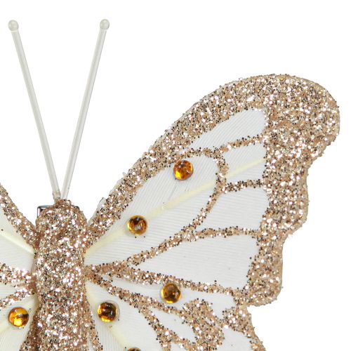 Produkt Ozdoba z piór motyle w kolorze złotym na klipsie 7,5x7cm 4 sztuki