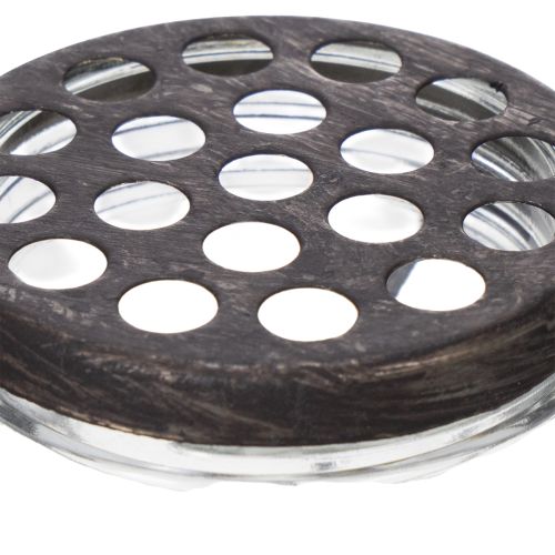 Produkt Szklana butelka w metalowym koszyku, idealna jako element dekoracyjny w salonie, 20 cm