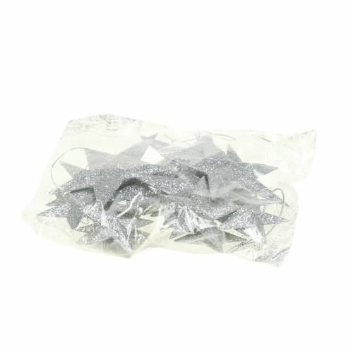 Produkt Gwiazdka brokatowa srebrna 9,5/5cm 18 szt