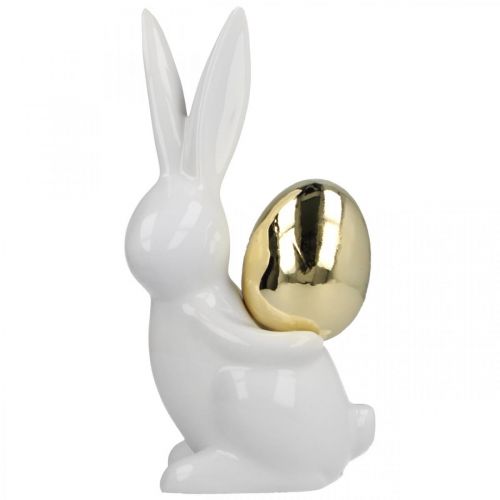Floristik24 Zajączki wielkanocne eleganckie, ceramiczne zajączki ze złotym jajkiem, dekoracja wielkanocna biała, złota W18cm 2szt
