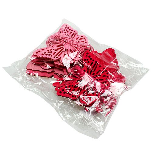 Floristik24 Motylki drewniane do zawieszenia różowe 8cm - 10cm 24szt.