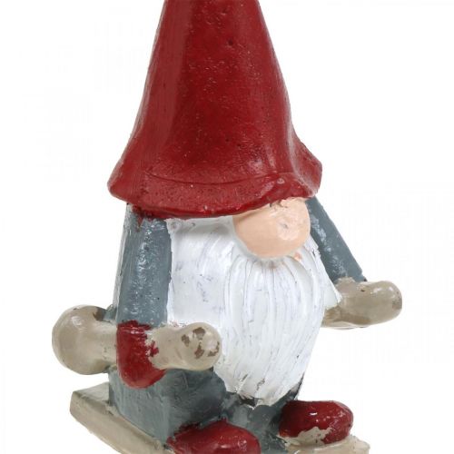 Floristik24 Świeca z motywem Świąteczny elf, dekoracja adwentowa, elf z nartami, świeca ozdobna W12cm