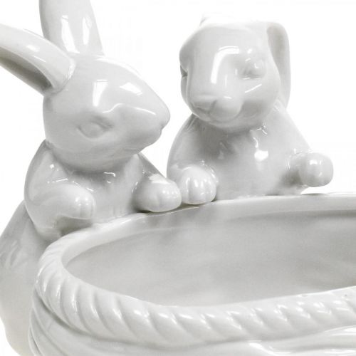 Produkt Króliki z gniazdem, dekoracja stołu, gniazdo wielkanocne, dekoracja porcelanowa, miska dekoracyjna biała dł.15cm wys.11cm