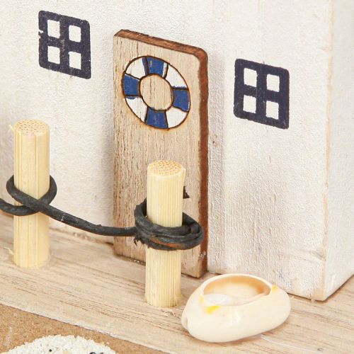 Produkt Morska dekoracja domków plażowych muszle naturalne niebieskie wys. 12 cm 4 szt.