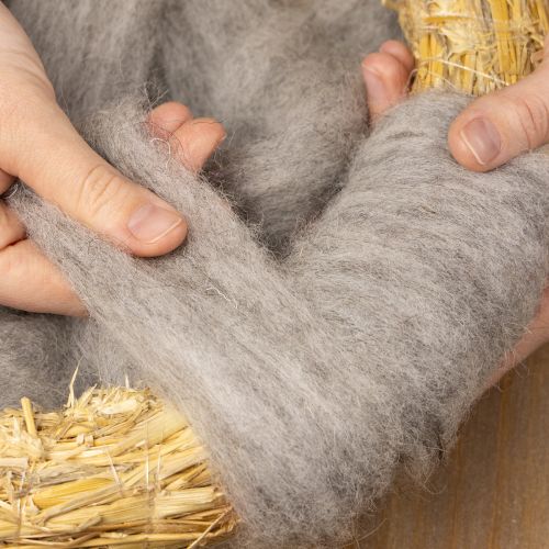 Produkt Sznurek wełniany dekoracyjny, szaro-naturalny, 2m, filcowany, do rękodzieła i florystyki