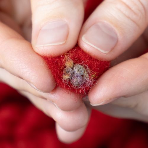 Produkt Puszysty sznurek wełniany Mirabell z jutą, czerwony, 25m