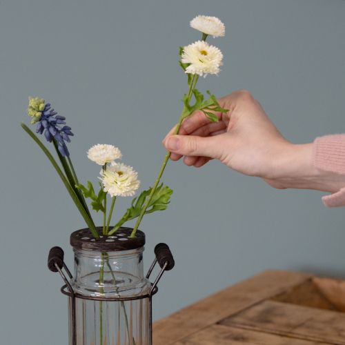 Produkt Szklana butelka w metalowym koszyku, idealna jako element dekoracyjny w salonie, 20 cm