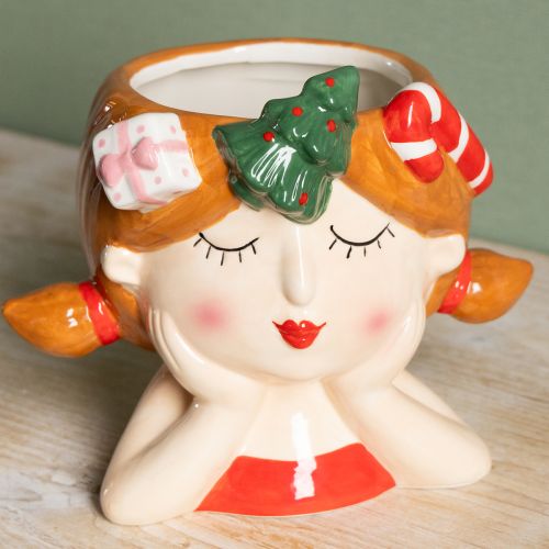 Produkt Ceramiczna doniczka dekoracyjna w kształcie dziewczynki z głową rośliny, wysokość 17 cm