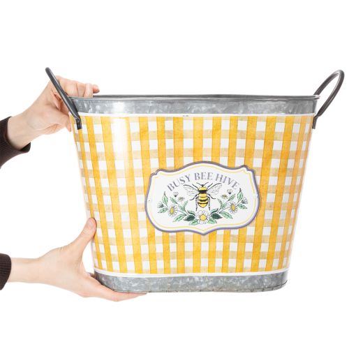 Produkt Doniczka owalna z motywem pszczoły, wzór w kratkę, letnia dekoracja, 38×24×29 cm