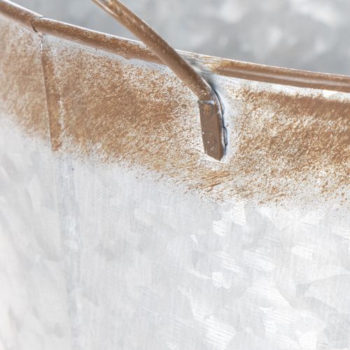 Produkt Doniczka z uchwytami, dekoracyjna misa z wykończeniem w kolorze rdzy, pojemnik metalowy w kolorze srebrnym Ø26cm H25,5cm