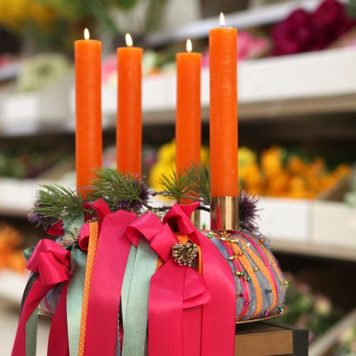 Produkt Świece stożkowe w kolorze pomarańczowym 34mm x 300mm 4 sztuki